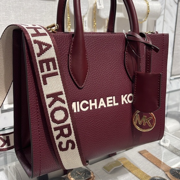 Michael Kors Mirella Small Pebbled Leather Crossbody Bag
Oxblood 
NWT - Picture 13 of 16